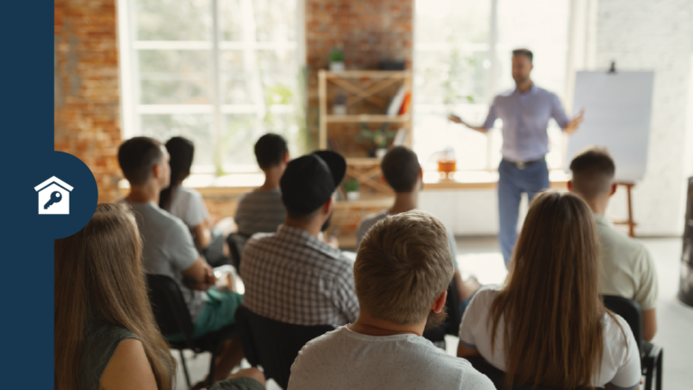 RentSmart picture, people in a room learning